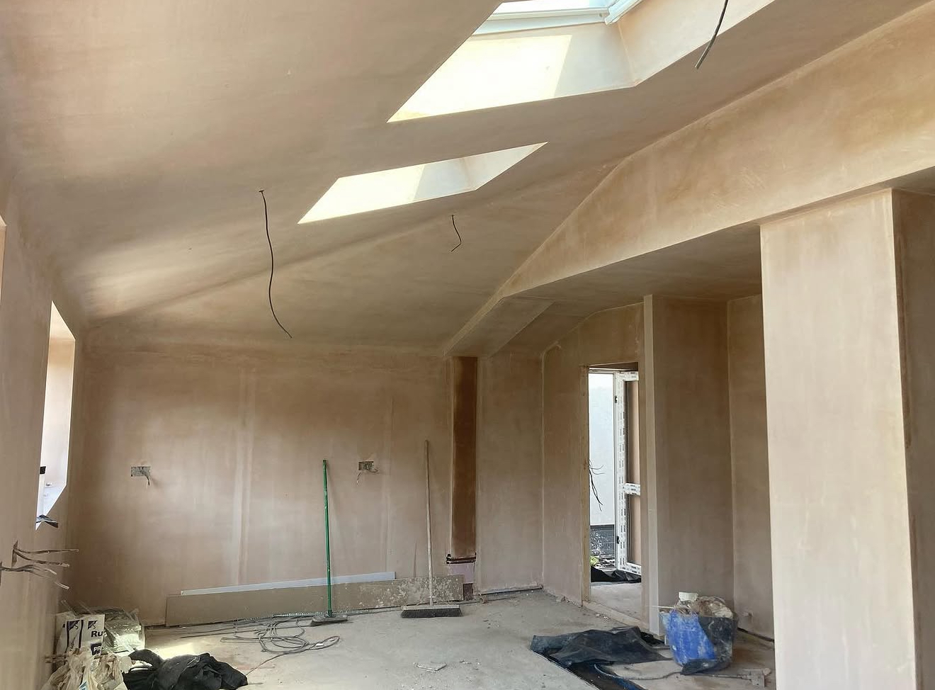 Plastered extension walls and ceiling