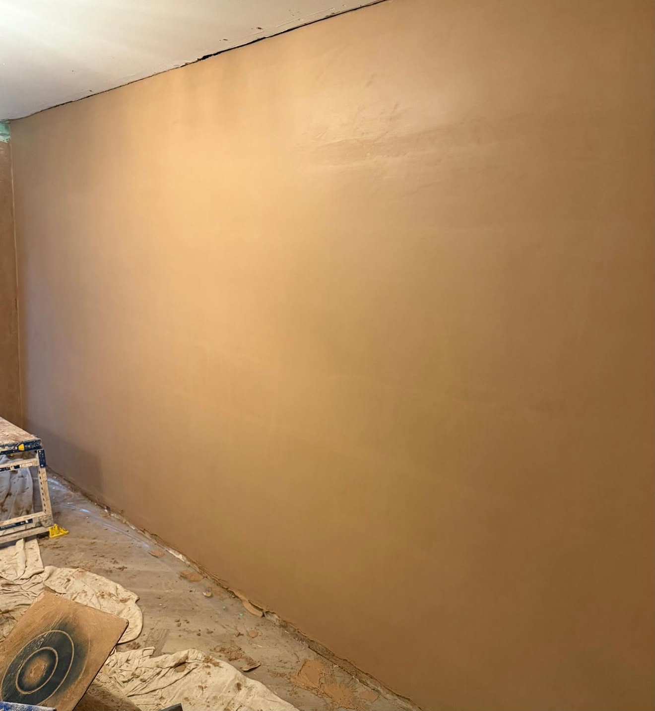 Long freshly plastered wall