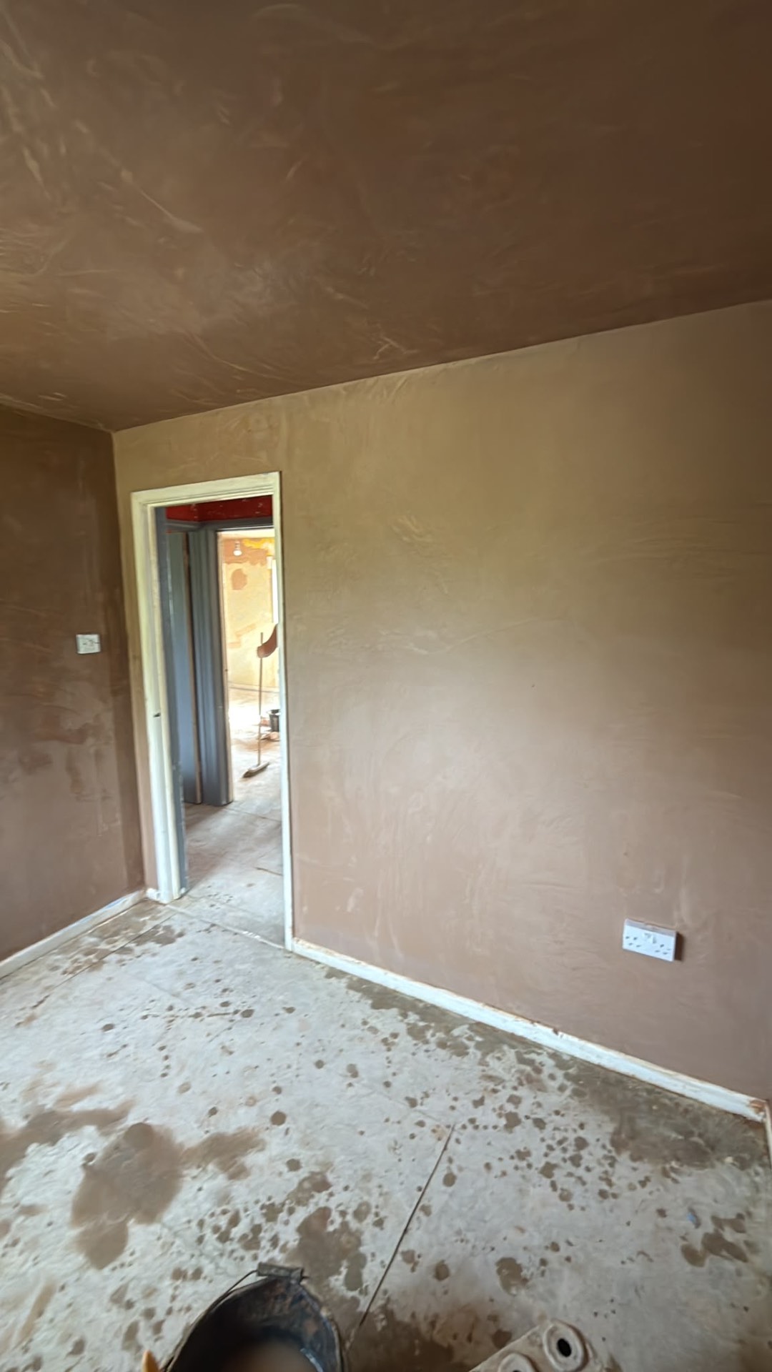 Freshly plastered room with a doorway