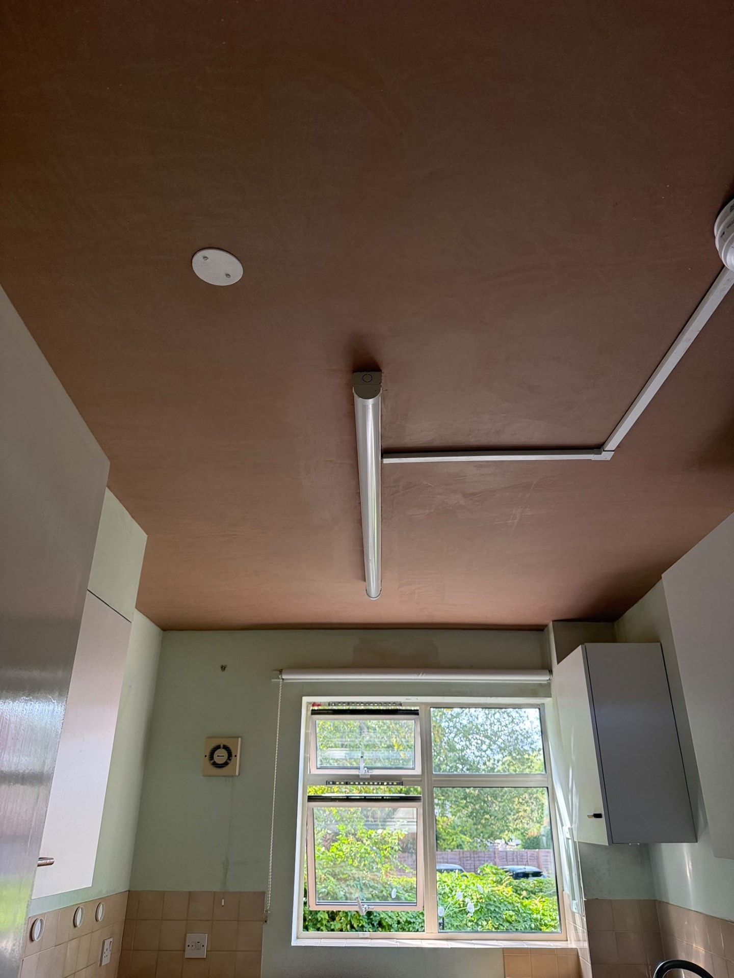 Freshly plastered kitchen ceiling