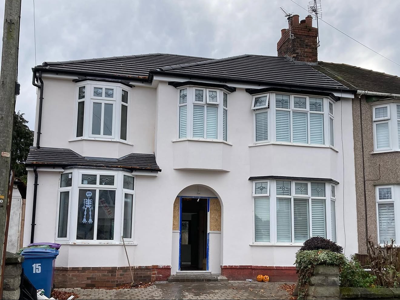 Rendered front of a semi-detached house